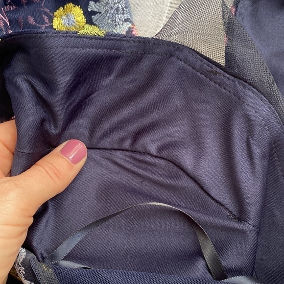 GB formal gown in navy with embroidered pink, yellow, and blue flowers. - Picture 9 of 15